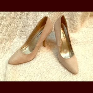Classic beige heeled pumps